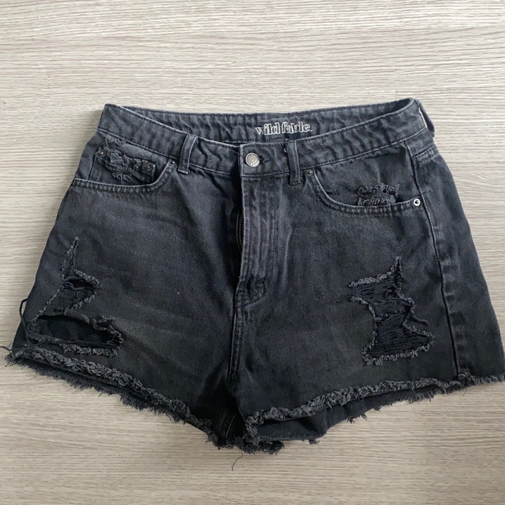 Black jean shorts, lightly distressed